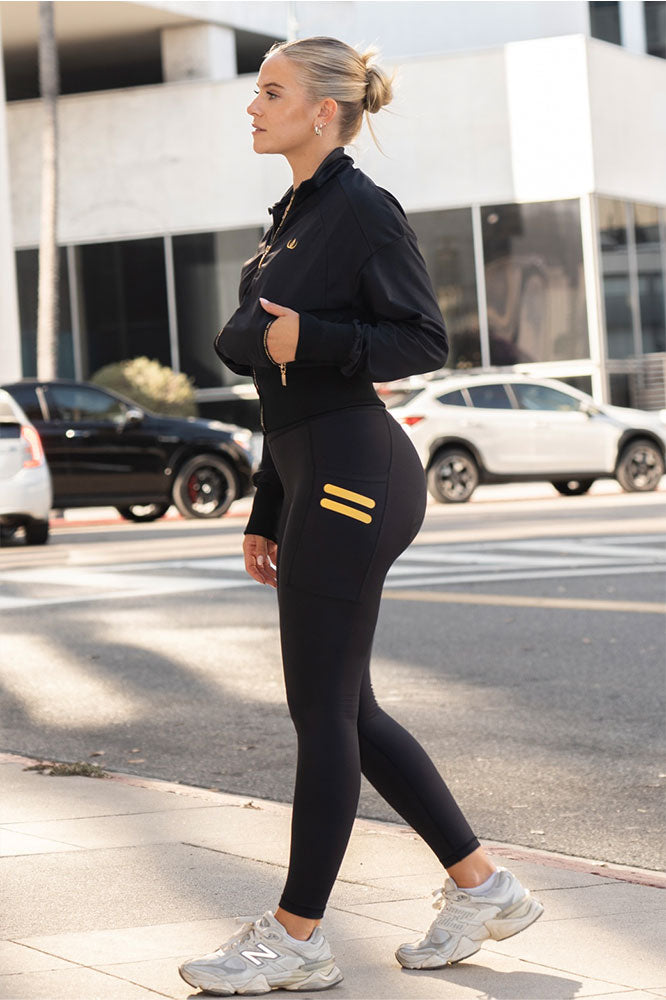 Iconic Stripe Tights Med Fickor sedd från sidan